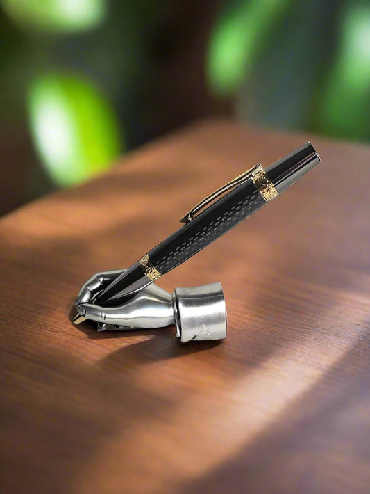 Pen: Flat Topped Black Carbon Fiber Sleeve Cast in Resin with a Gold and Gunmetal Pen Kit