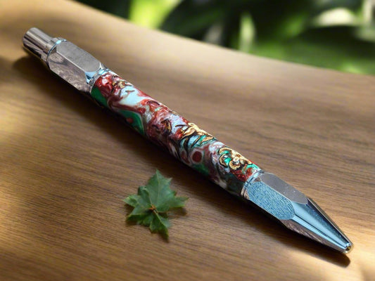 Pen: Hexagonal Christmas Colors Vertex Click Pen with Pinecones Swirled in Holiday Resin and Accompanied by a Chrome Pen Kit